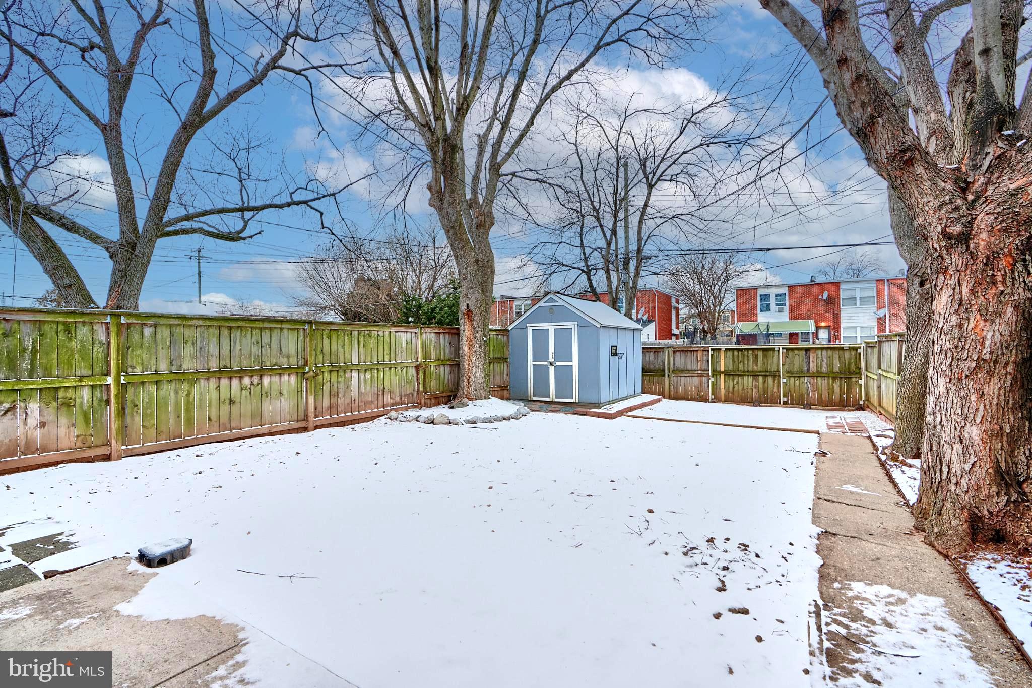 8014 Lansdale Road Baltimore, MD 21224 - Photo 35 of 41 SPACIOUS REAR YARD - STONE PARKING SPACE & PAVERS
