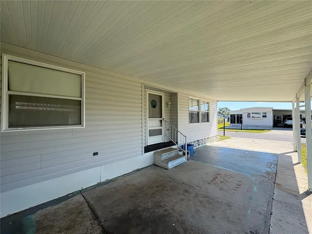 a view of a house with a patio