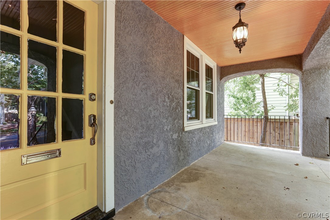111 Overbrook Road Richmond, VA 23222 - Photo 4 of 43 Original 9 panel solid wood front door and a cover
