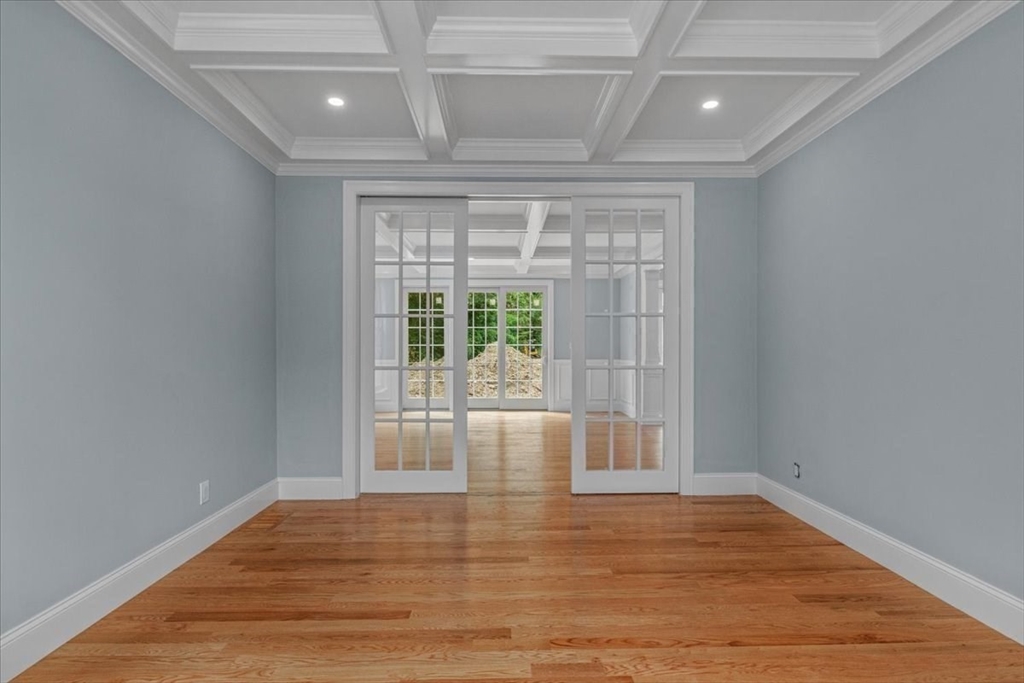 35 Shuttleworth Dedham, MA 02026 - Photo 12 of 28 a view of empty room with wooden floor and fan