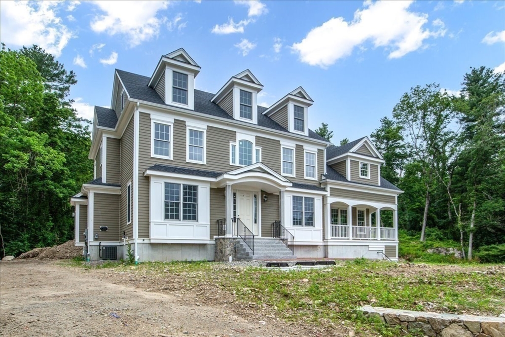 35 Shuttleworth Dedham, MA 02026 - Photo 27 of 28 a front view of a house with a yard