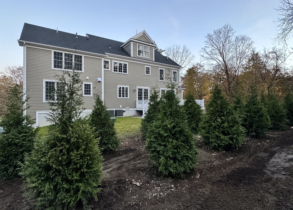 35 Shuttleworth Dedham, MA 02026 - Photo 28 of 28 a front view of a house with plants and trees