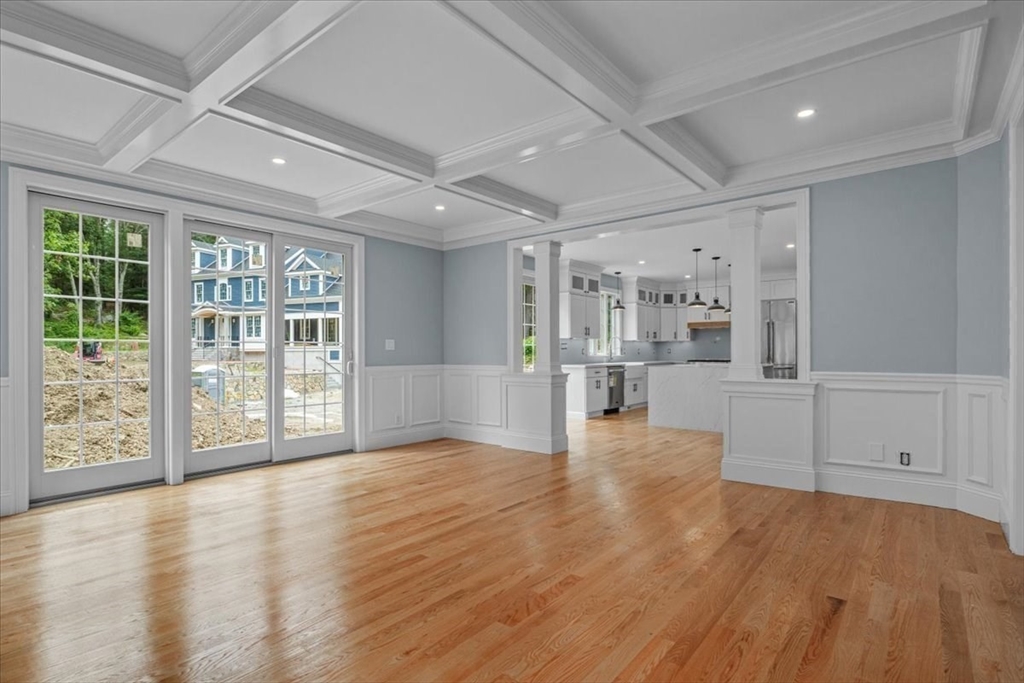 35 Shuttleworth Dedham, MA 02026 - Photo 4 of 28 a view of an empty room with wooden floor and a window