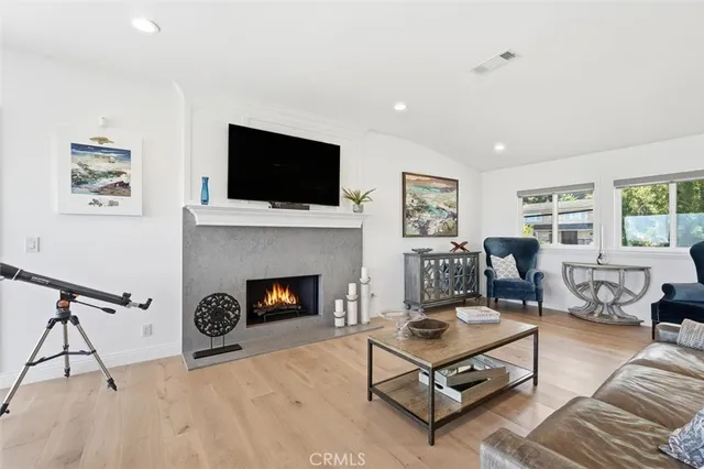 a stove top oven sitting inside of a kitchen