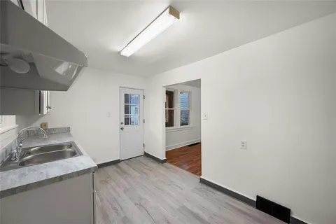 a view of a room that has a toilet in it