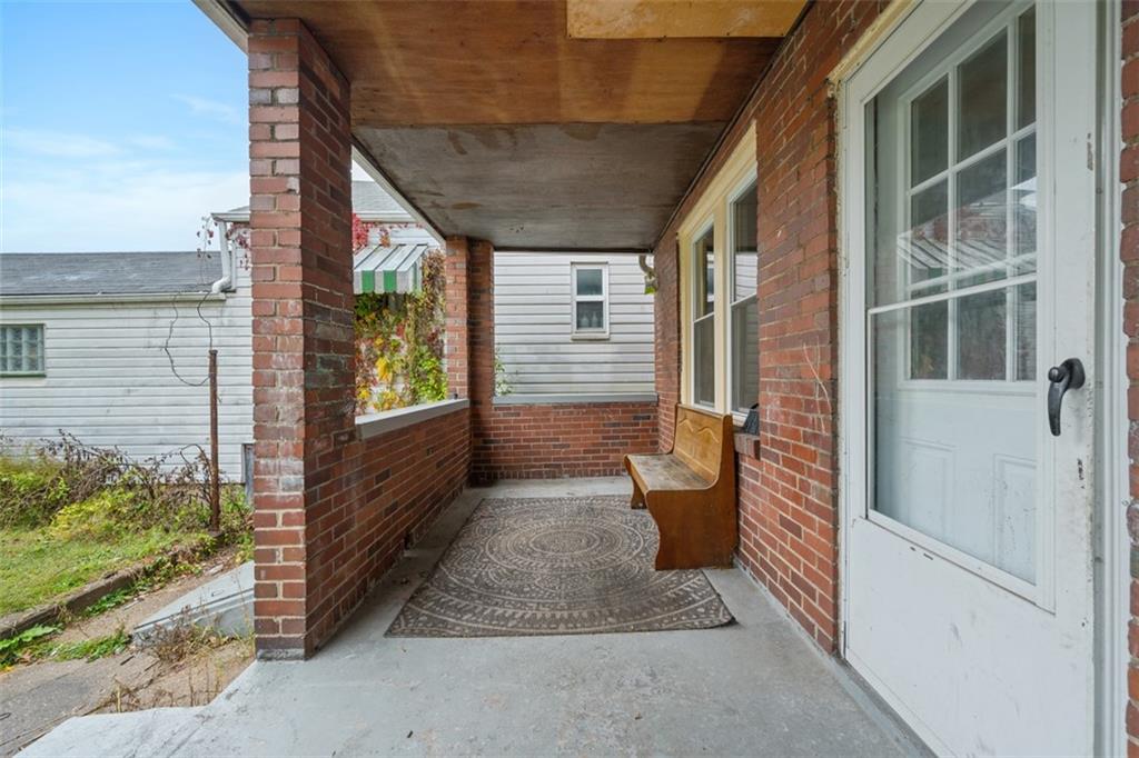 1128 9th Street McKees Rocks, PA 15136 - Photo 25 of 33 a view of porch with seating space