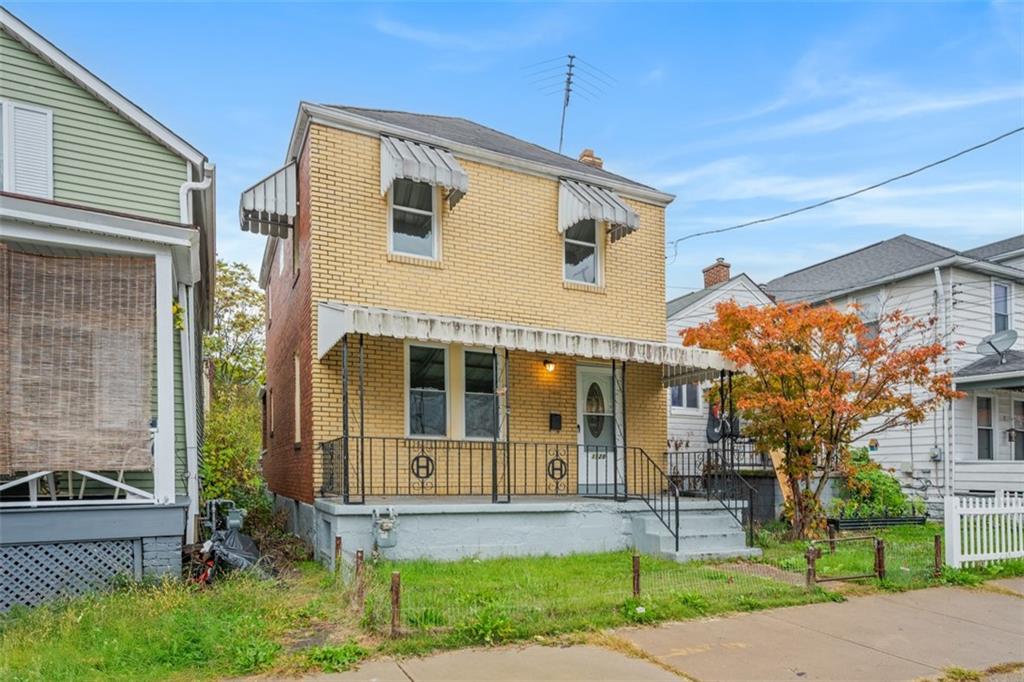 1128 9th Street McKees Rocks, PA 15136 - Photo 32 of 33 a view of a house with a yard