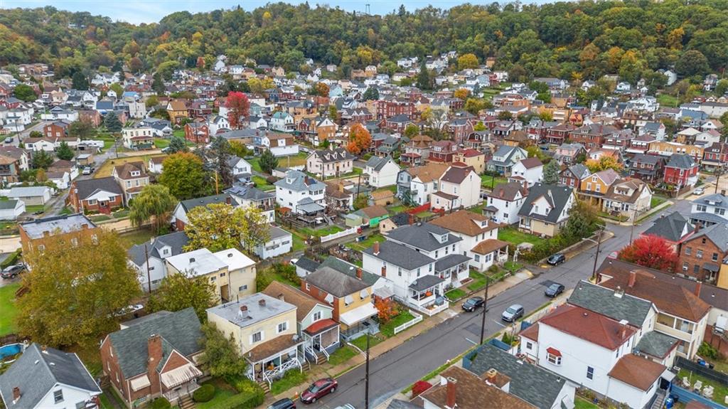 1128 9th Street McKees Rocks, PA 15136 - Photo 5 of 33 an aerial view of a city with lots of residential buildings