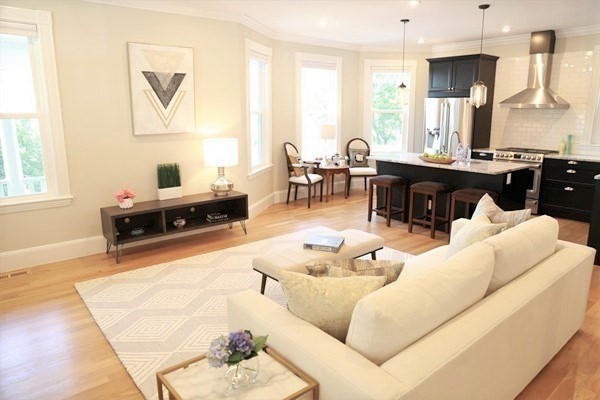 40 Evergreen Avenue, Unit 1 Somerville, MA 02145 - Photo 2 of 24 a living room with furniture kitchen view and a window