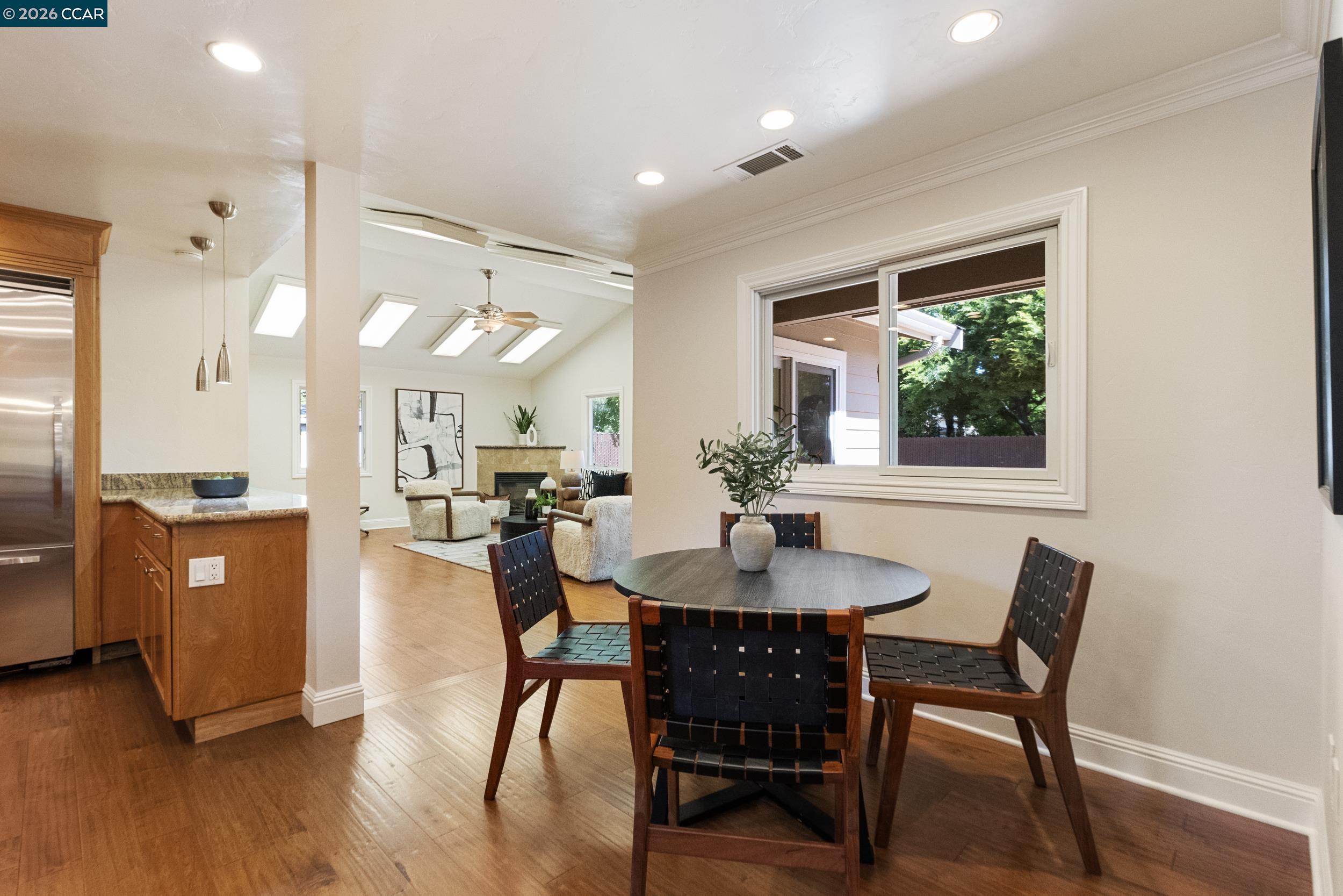 484 Diablo Road Danville, CA 94526 - Photo 26 of 39 a view of a dining room with furniture and wooden floor