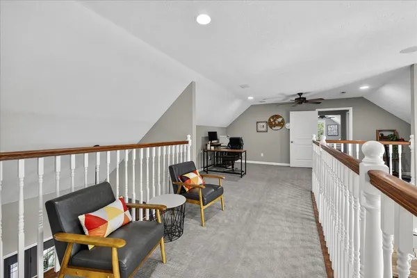 a view of a lake with a yard