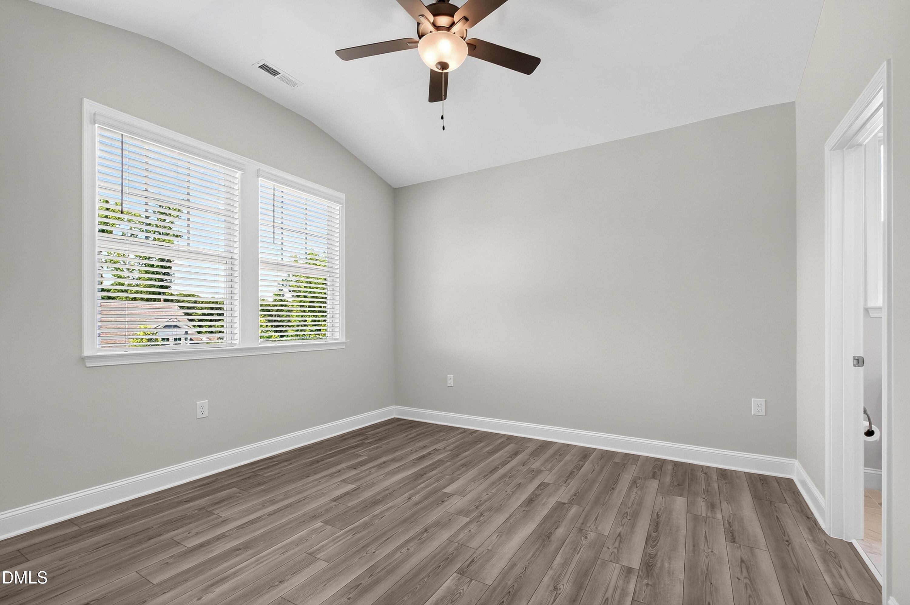 1300 Commons Ford Place Apex, NC 27539 - Photo 50 of 70 wooden floor in an empty room with a window