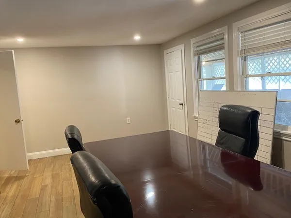 a view of livingroom with furniture and windows