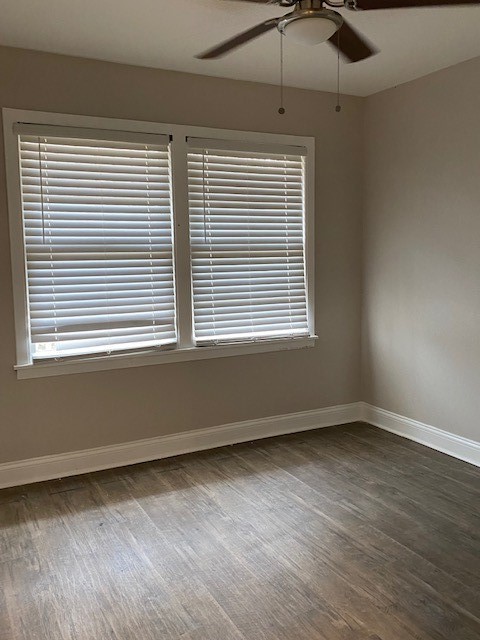 5709 Beechnut Street Houston, TX 77074 - Photo 4 of 15 a view of an empty room with a window