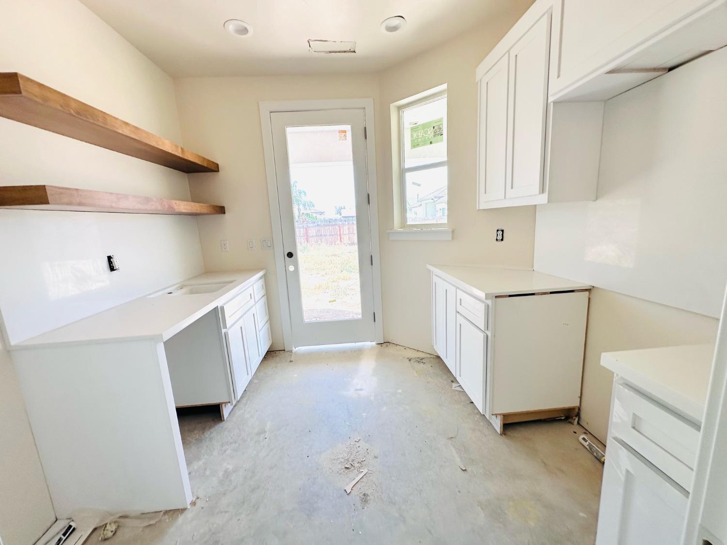 3076 Lester Avenue Clovis, CA 93619 - Photo 13 of 47 a view of an empty room with a window