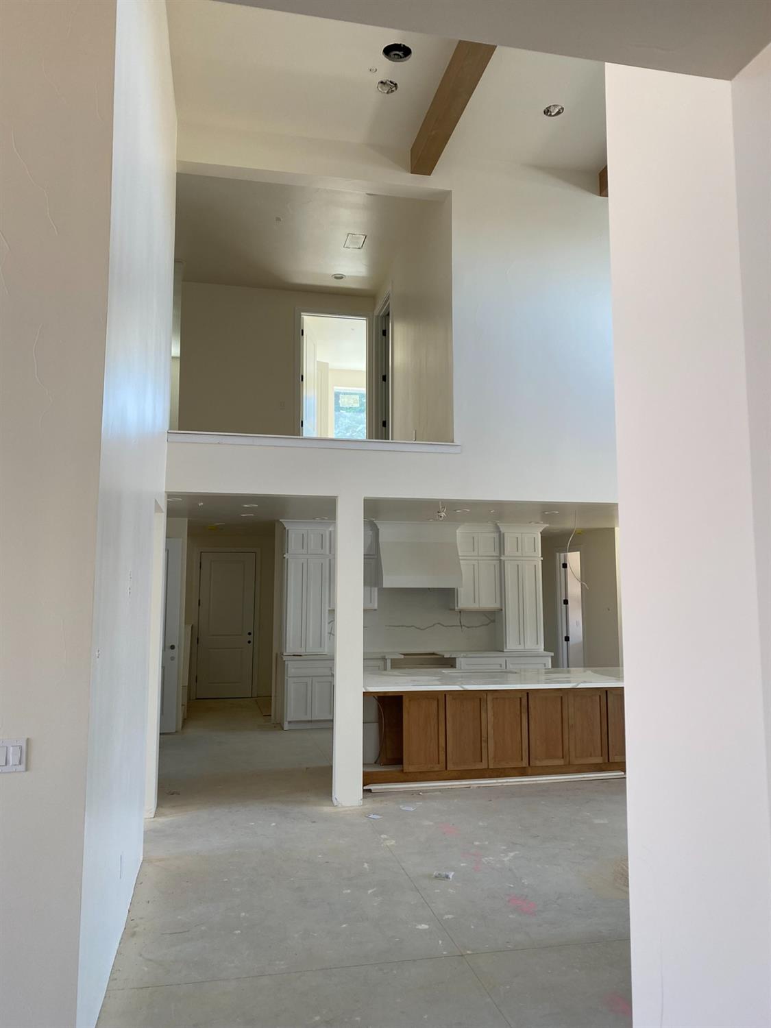 3076 Lester Avenue Clovis, CA 93619 - Photo 22 of 47 a view of kitchen and hallway