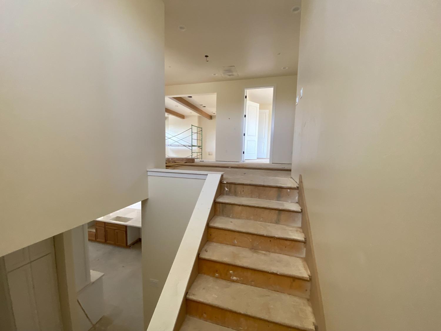 3076 Lester Avenue Clovis, CA 93619 - Photo 26 of 47 a view of a hallway with staircase
