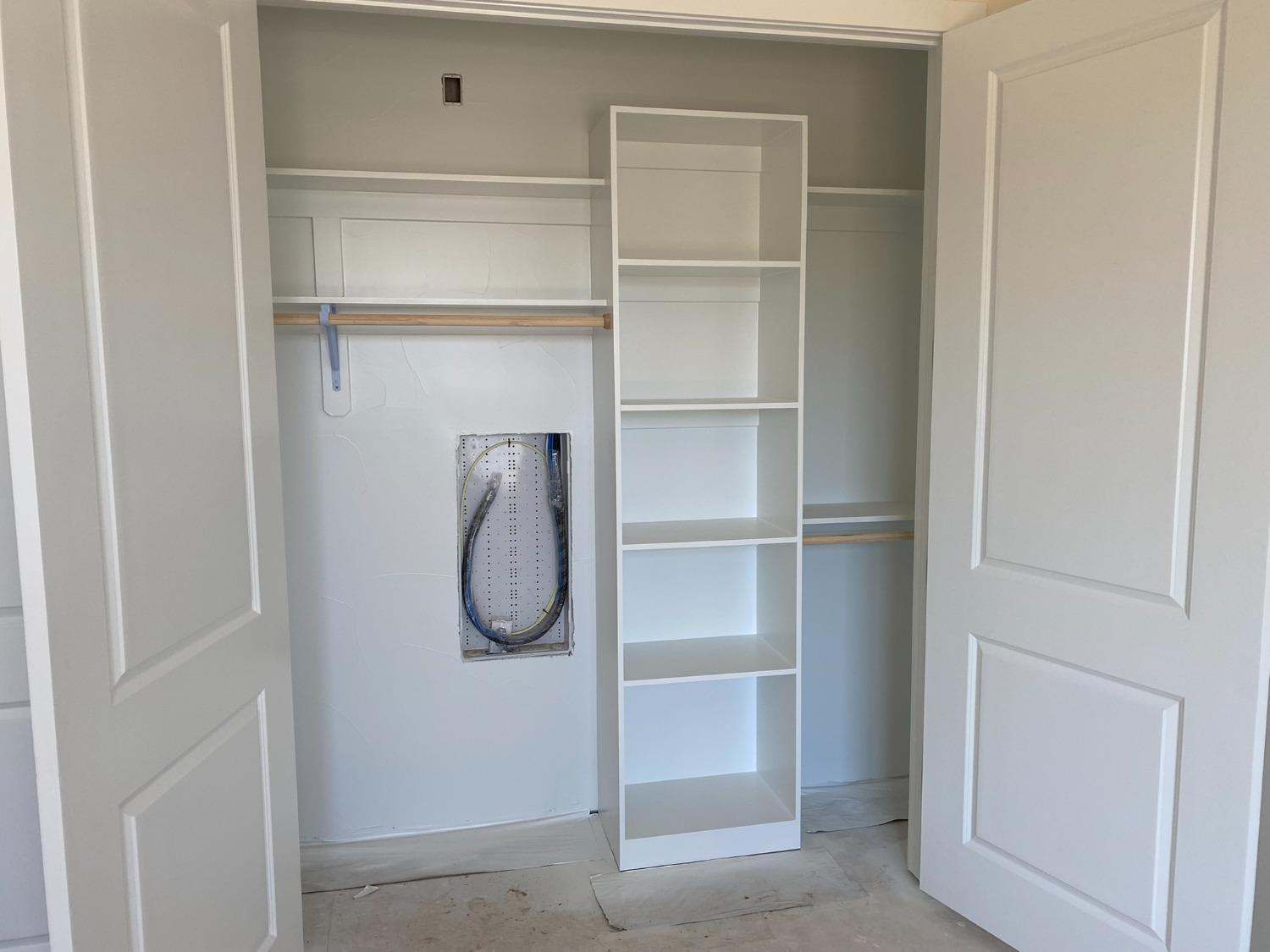 3076 Lester Avenue Clovis, CA 93619 - Photo 27 of 47 a walk in closet with a glass shower