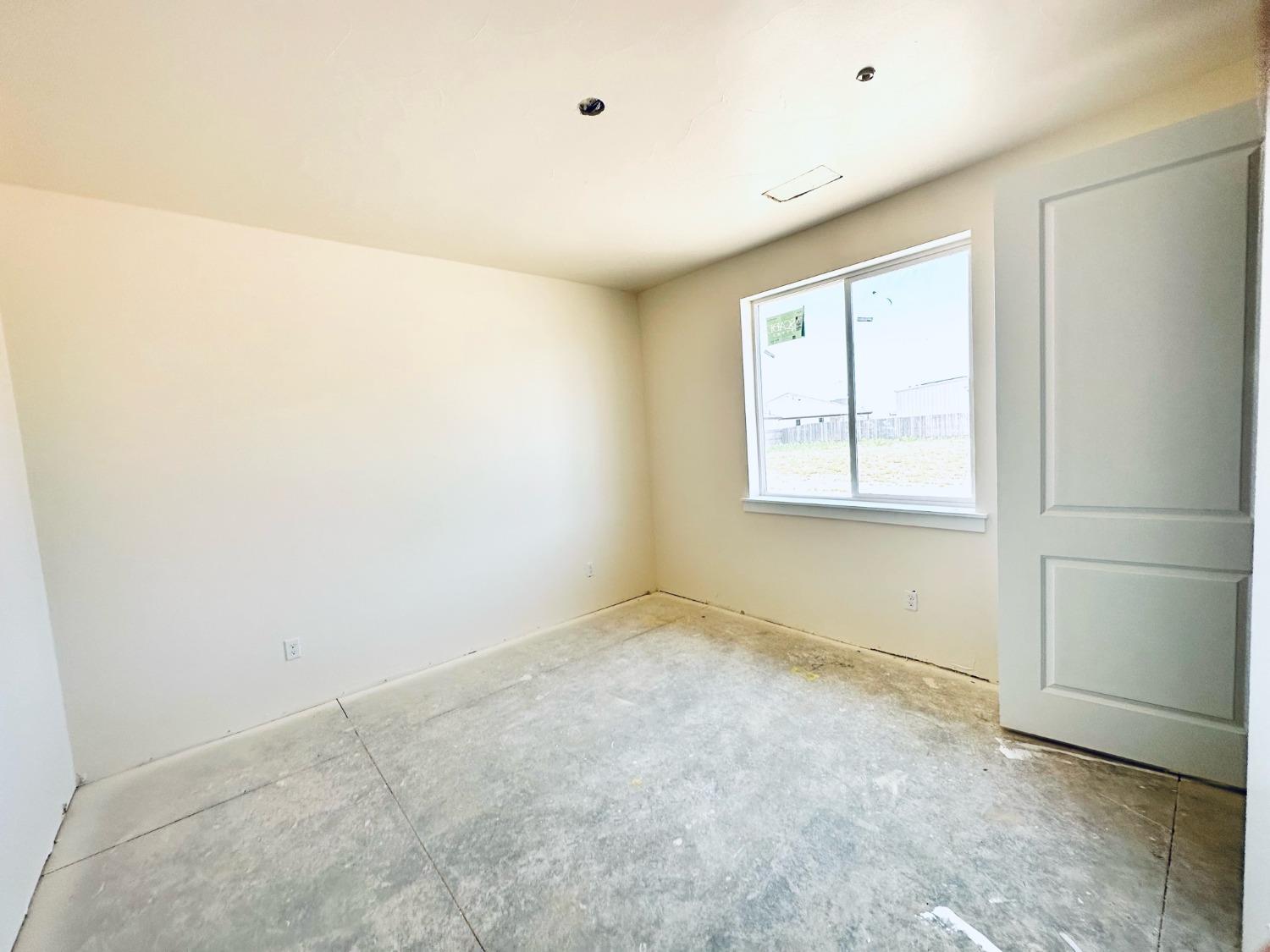 3076 Lester Avenue Clovis, CA 93619 - Photo 37 of 47 an empty room with a window