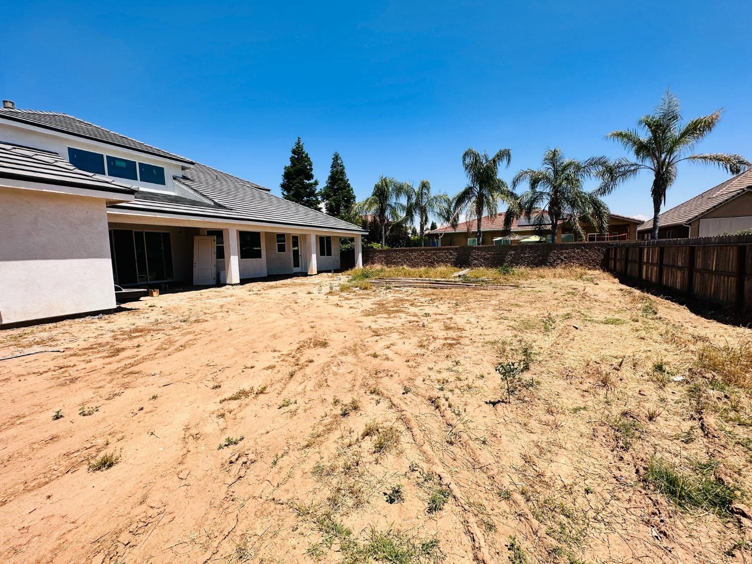 3076 Lester Avenue Clovis, CA 93619 - Photo 45 of 47 a view of a house with a snow in front of it