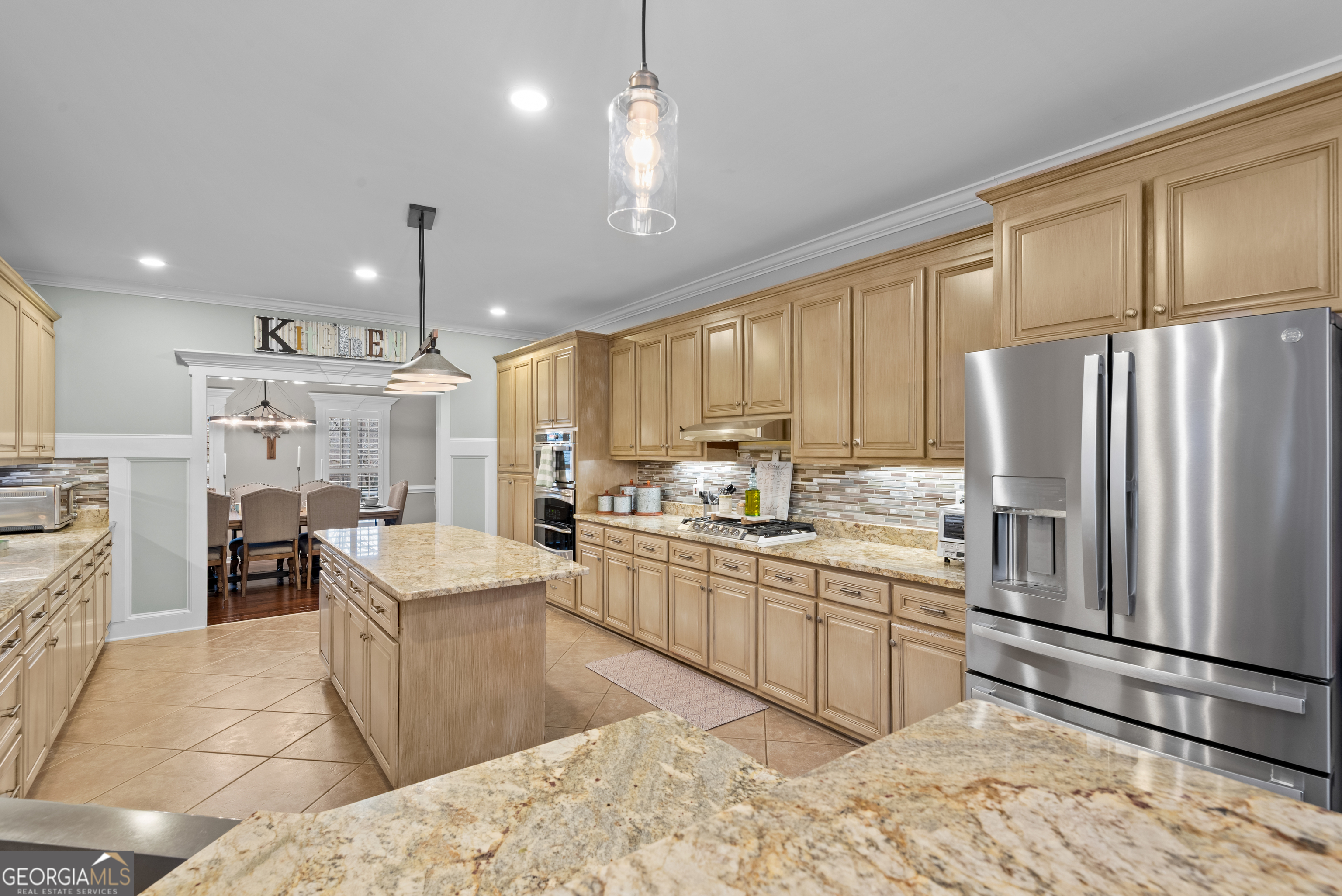 414 Parker Branch Road Barnesville, GA 30204 - Photo 24 of 101 a kitchen with stainless steel appliances a sink stove and refrigerator