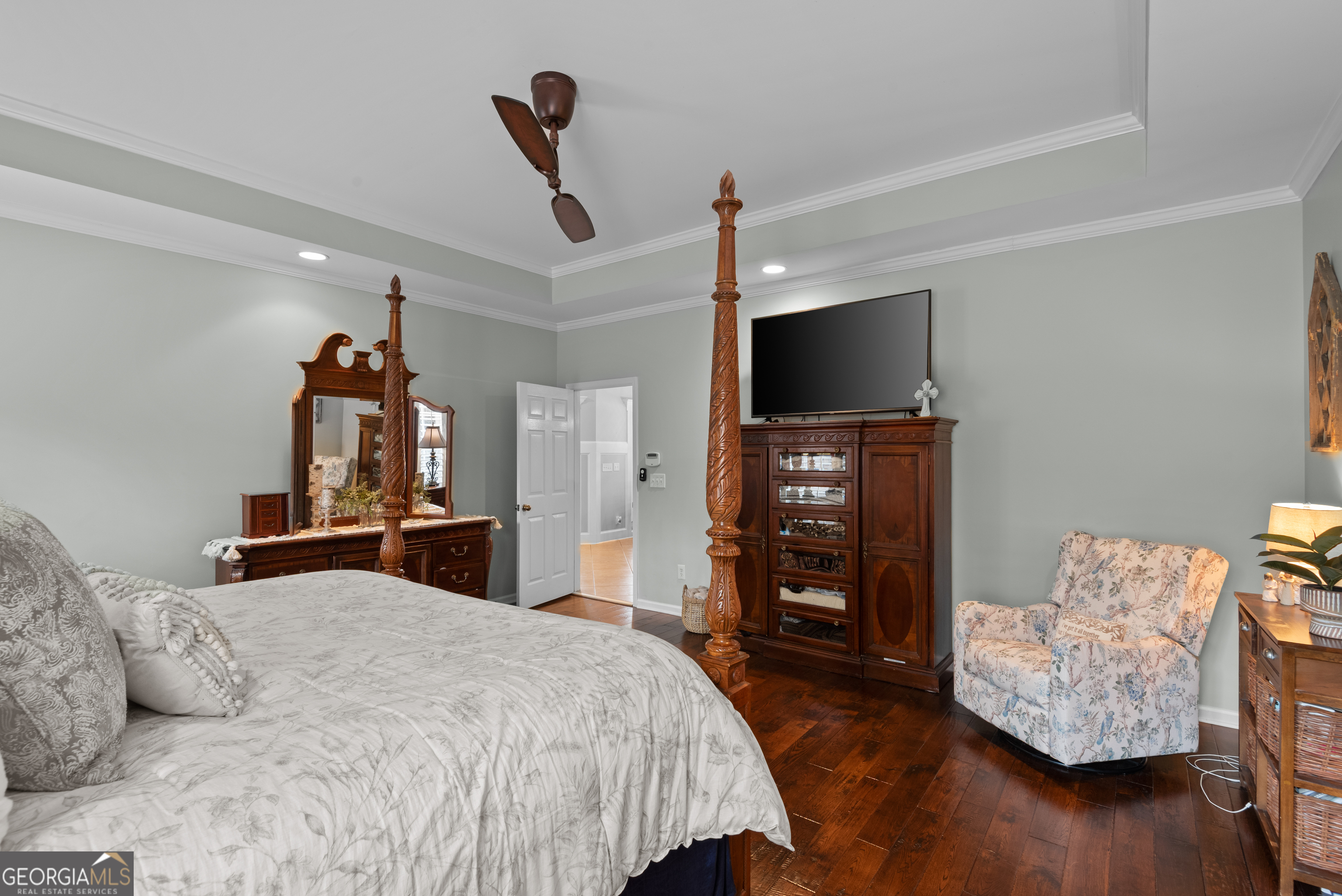 414 Parker Branch Road Barnesville, GA 30204 - Photo 36 of 101 a bedroom with bed and a flat tv screen on dresser