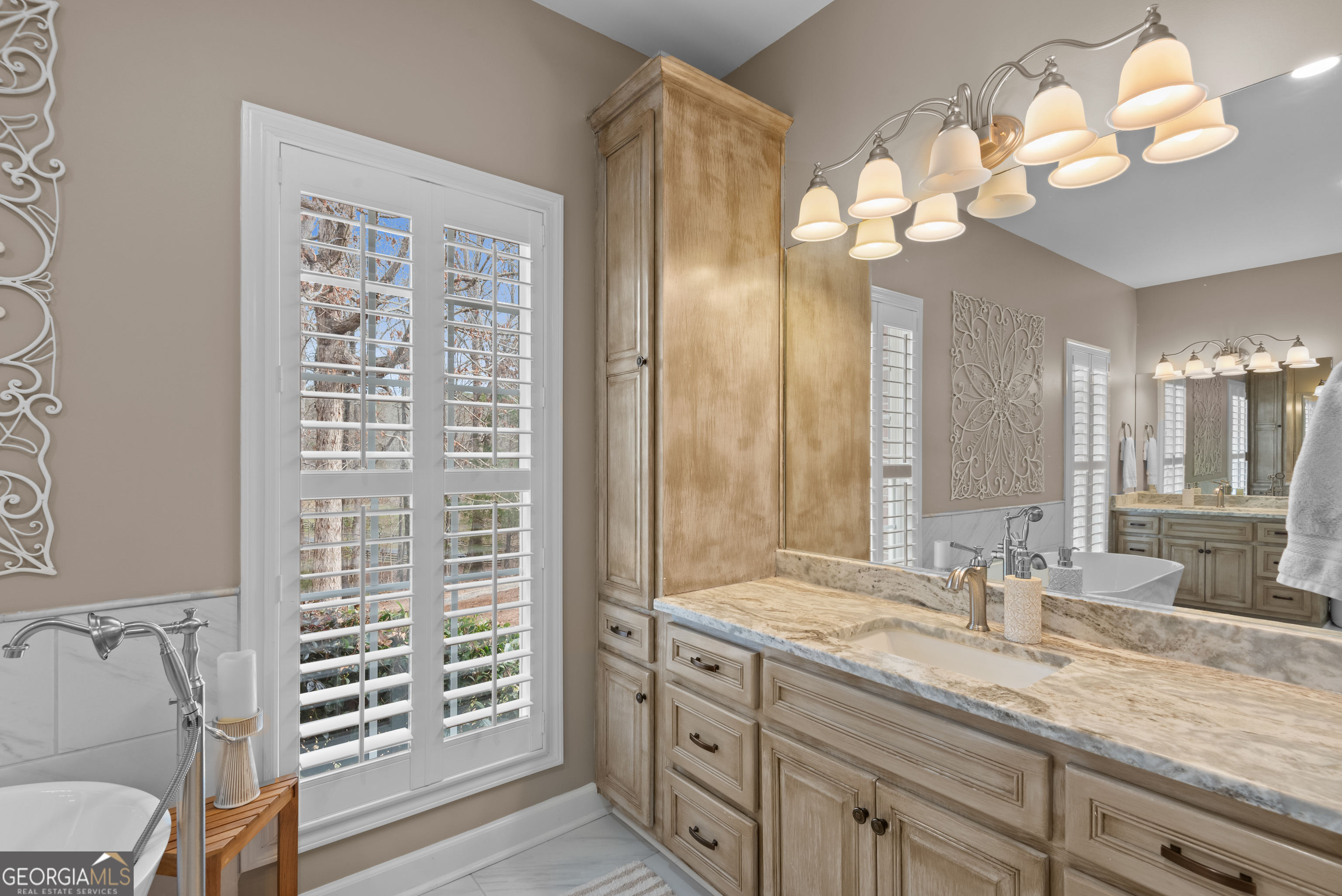 414 Parker Branch Road Barnesville, GA 30204 - Photo 40 of 101 a bathroom with a double vanity sink and a mirror
