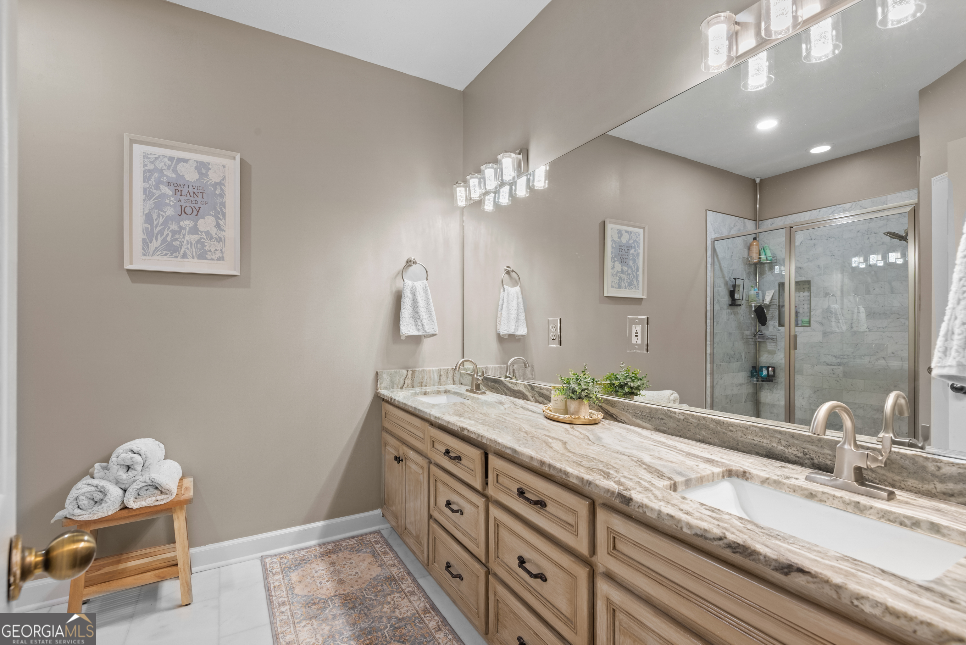 414 Parker Branch Road Barnesville, GA 30204 - Photo 47 of 101 a bathroom with a double vanity sink and a mirror