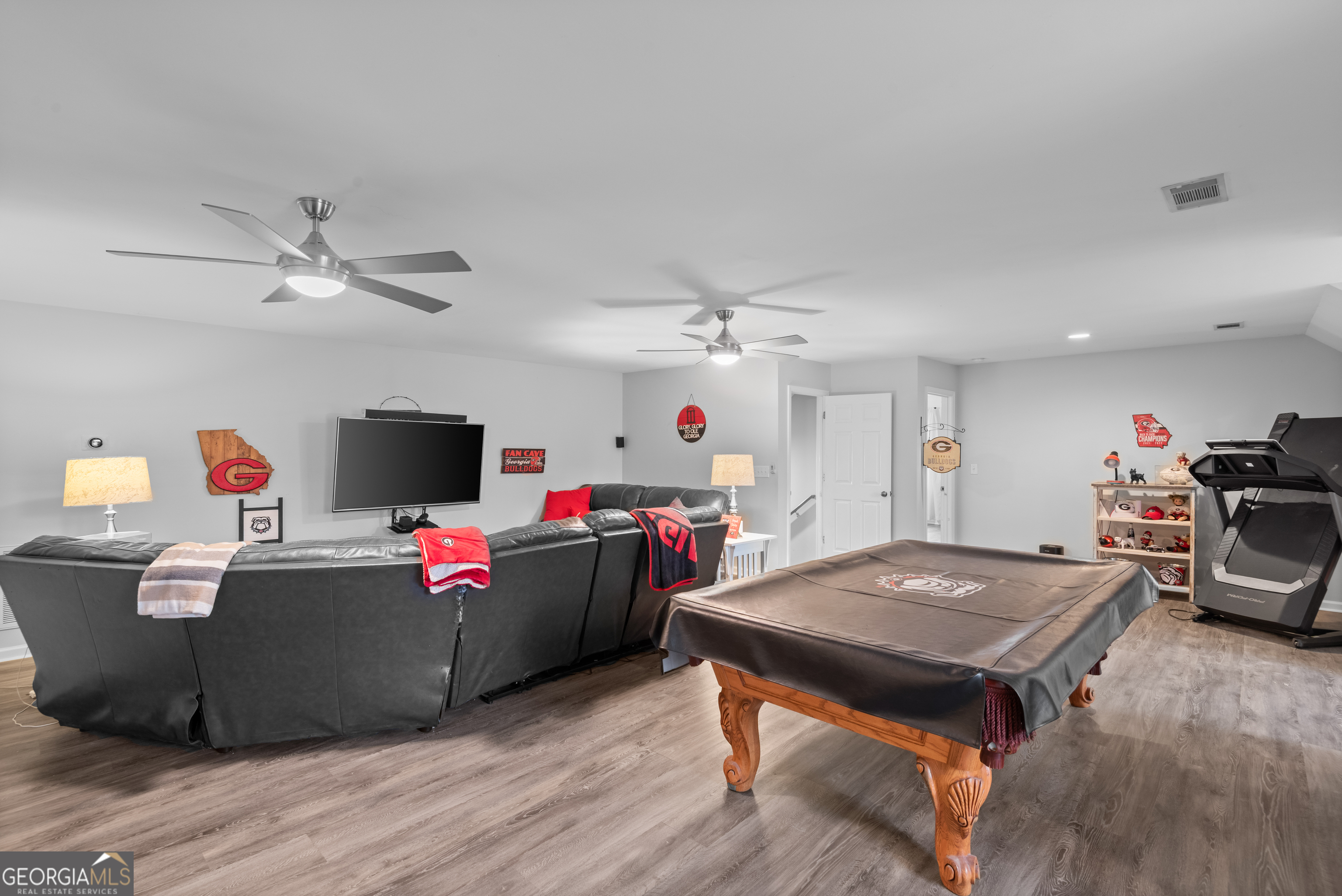 414 Parker Branch Road Barnesville, GA 30204 - Photo 52 of 101 a living room with furniture and flat screen tv