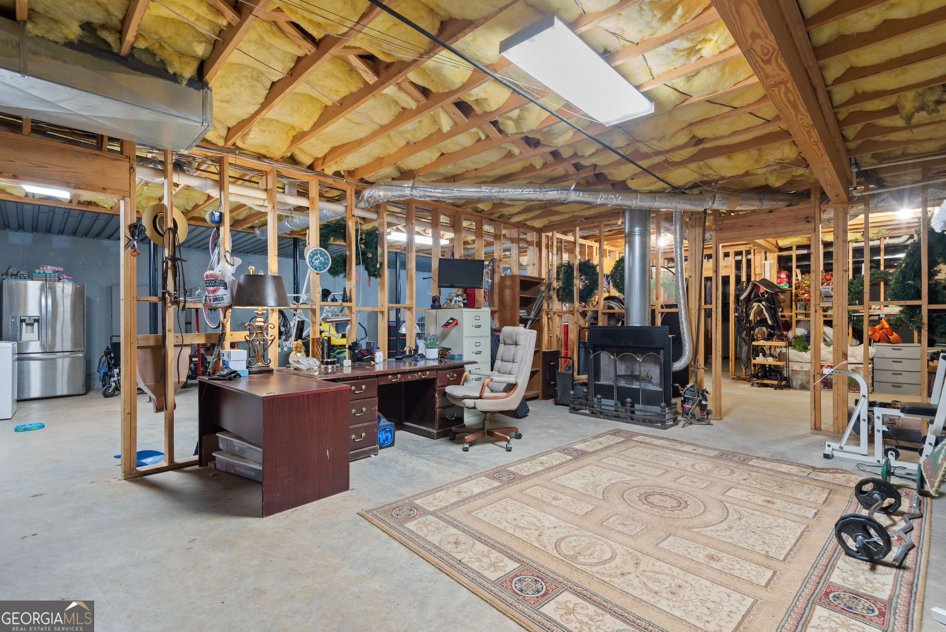 414 Parker Branch Road Barnesville, GA 30204 - Photo 64 of 101 a view of a room with gym equipment