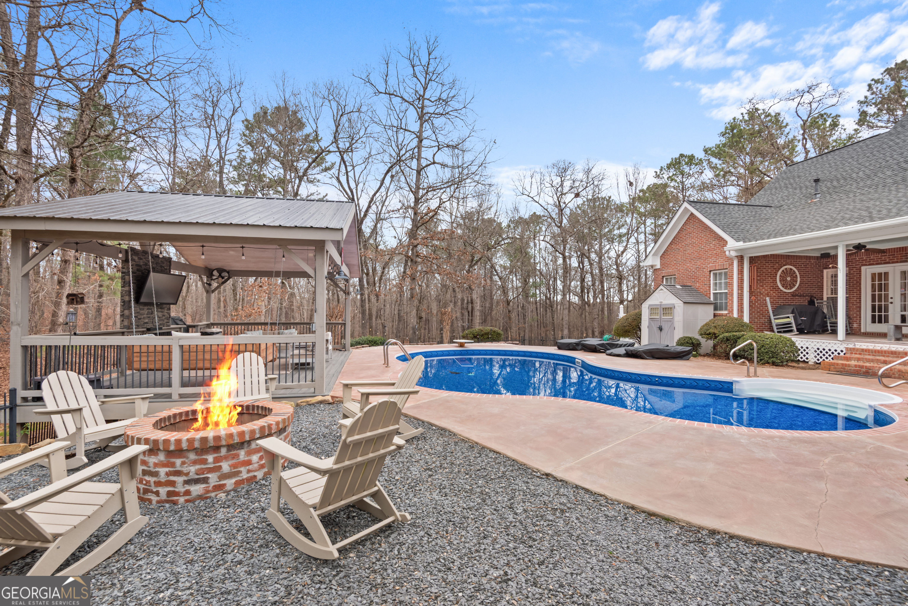 414 Parker Branch Road Barnesville, GA 30204 - Photo 75 of 101 a view of a house with swimming pool and sitting area
