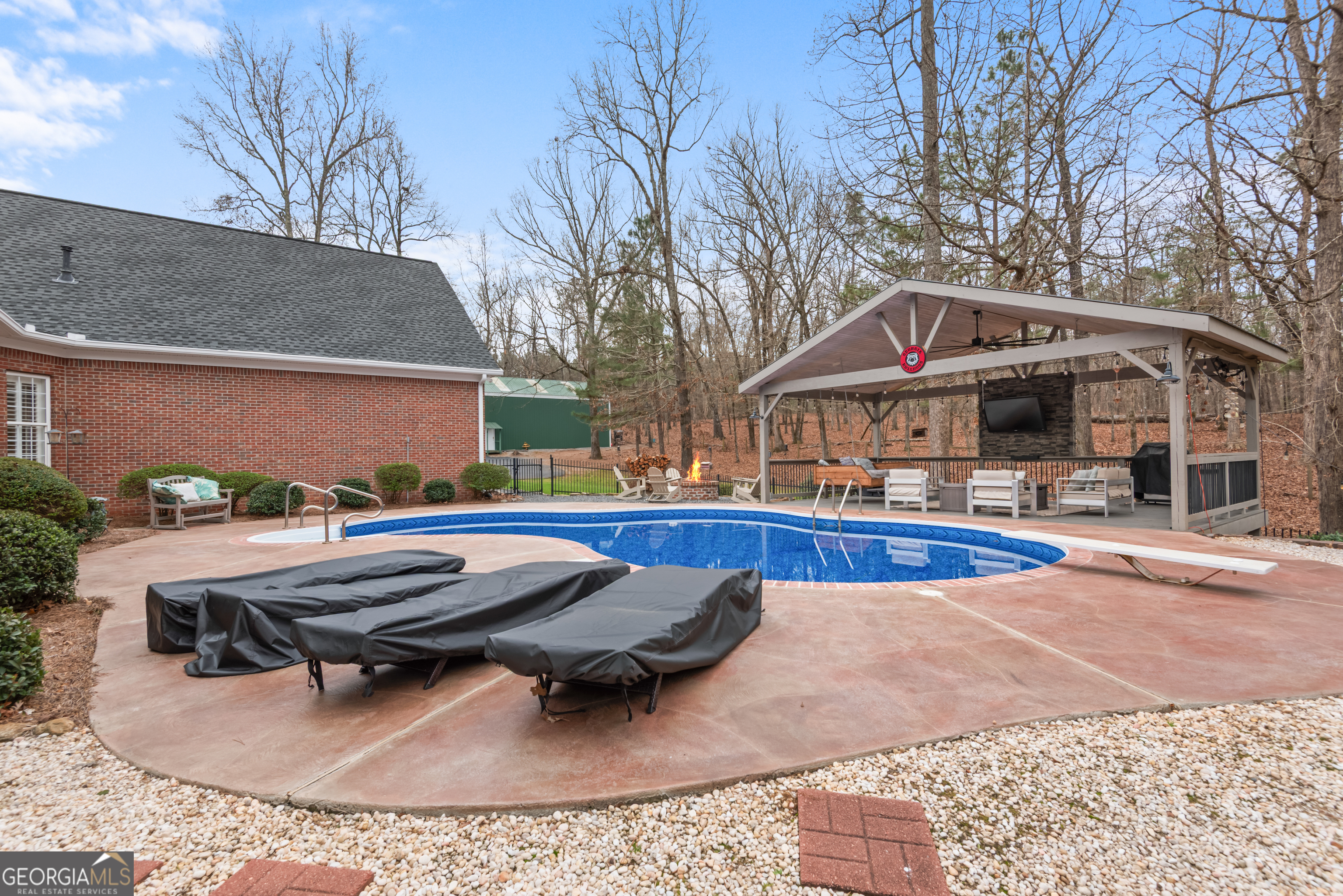 414 Parker Branch Road Barnesville, GA 30204 - Photo 77 of 101 a view of a house with swimming pool and sitting area