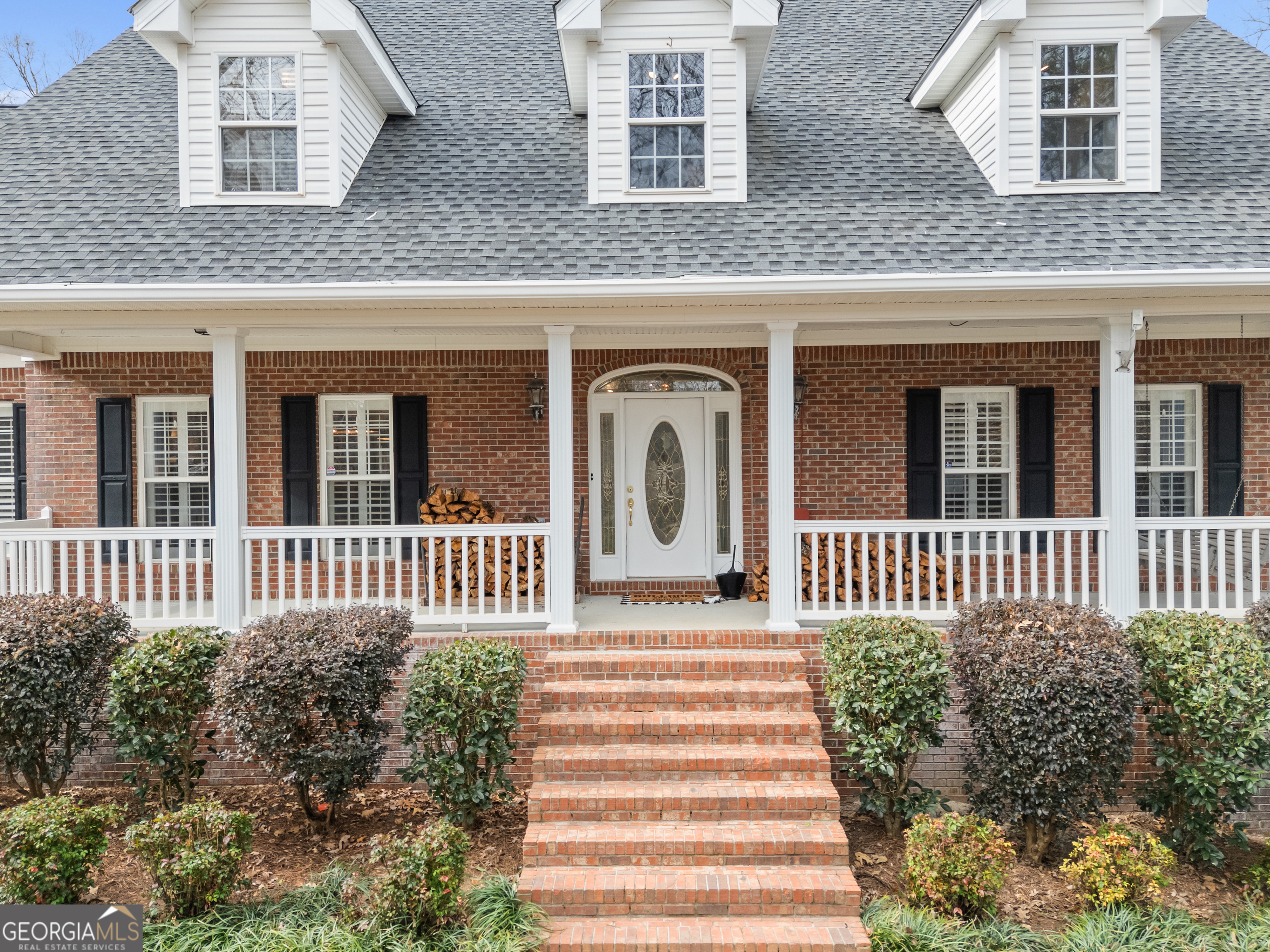 414 Parker Branch Road Barnesville, GA 30204 - Photo 8 of 101 a front view of a house with a garden