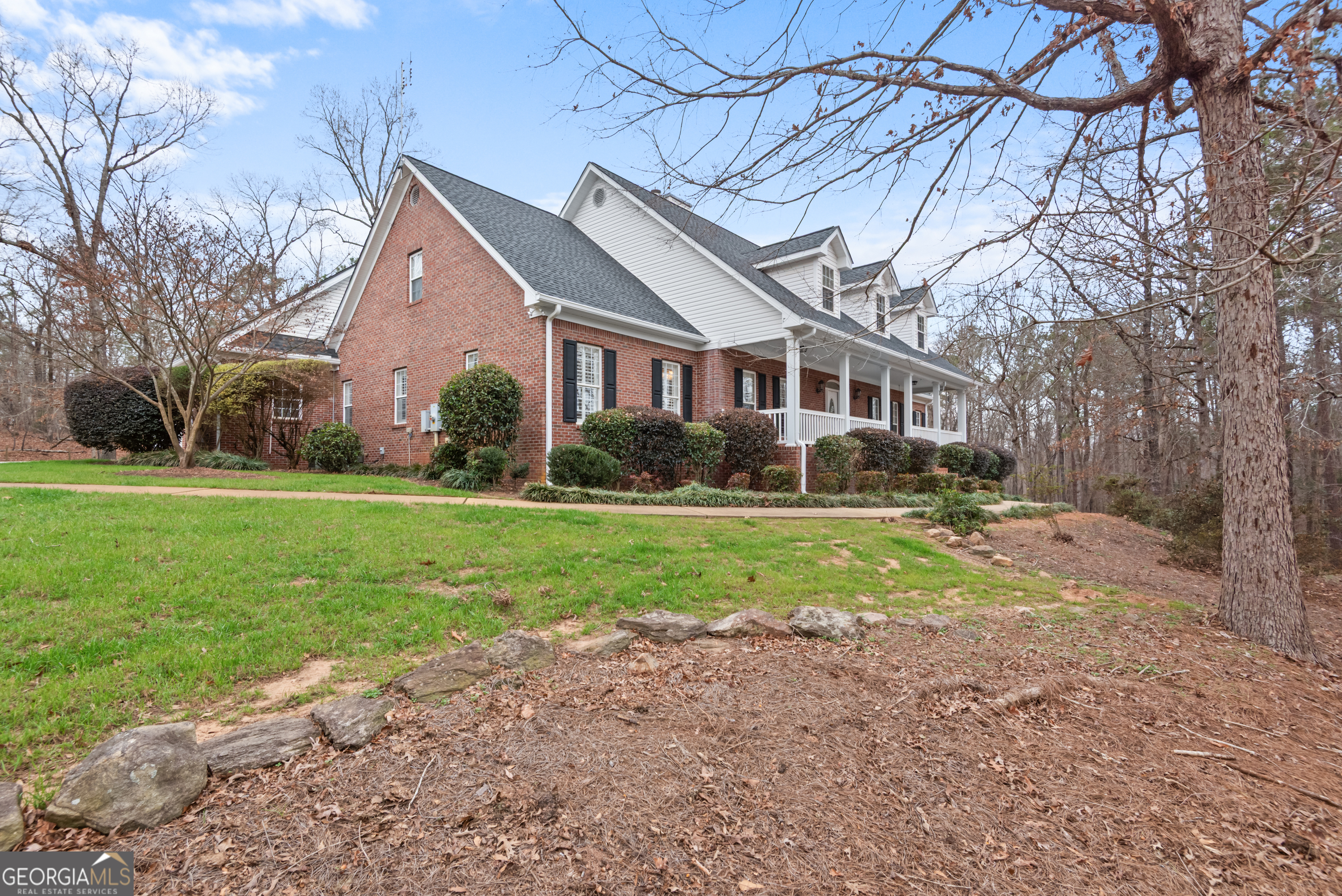 414 Parker Branch Road Barnesville, GA 30204 - Photo 85 of 101 a front view of house with yard and green space