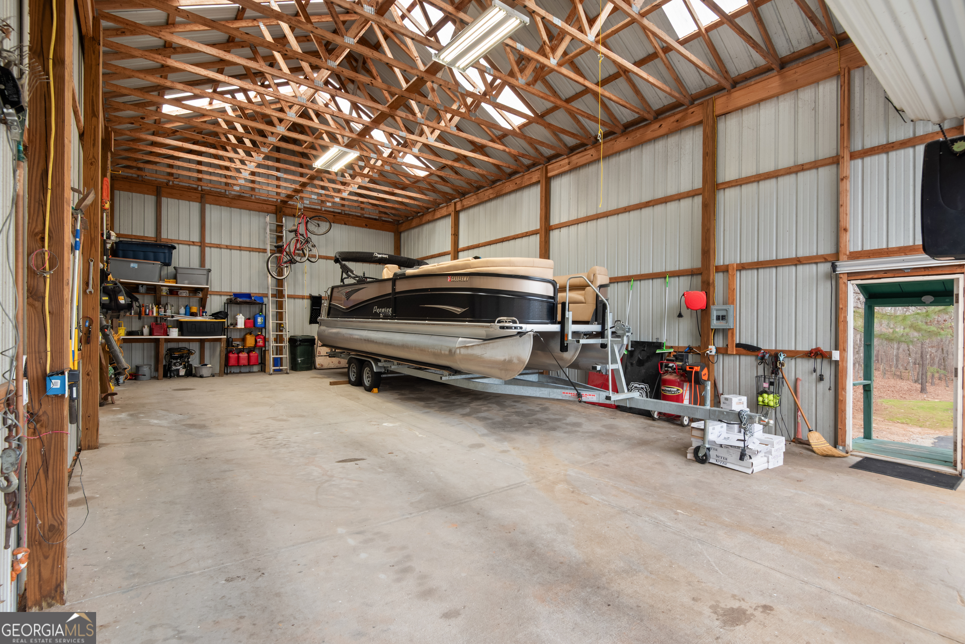 414 Parker Branch Road Barnesville, GA 30204 - Photo 88 of 101 a view of parking garage with cars