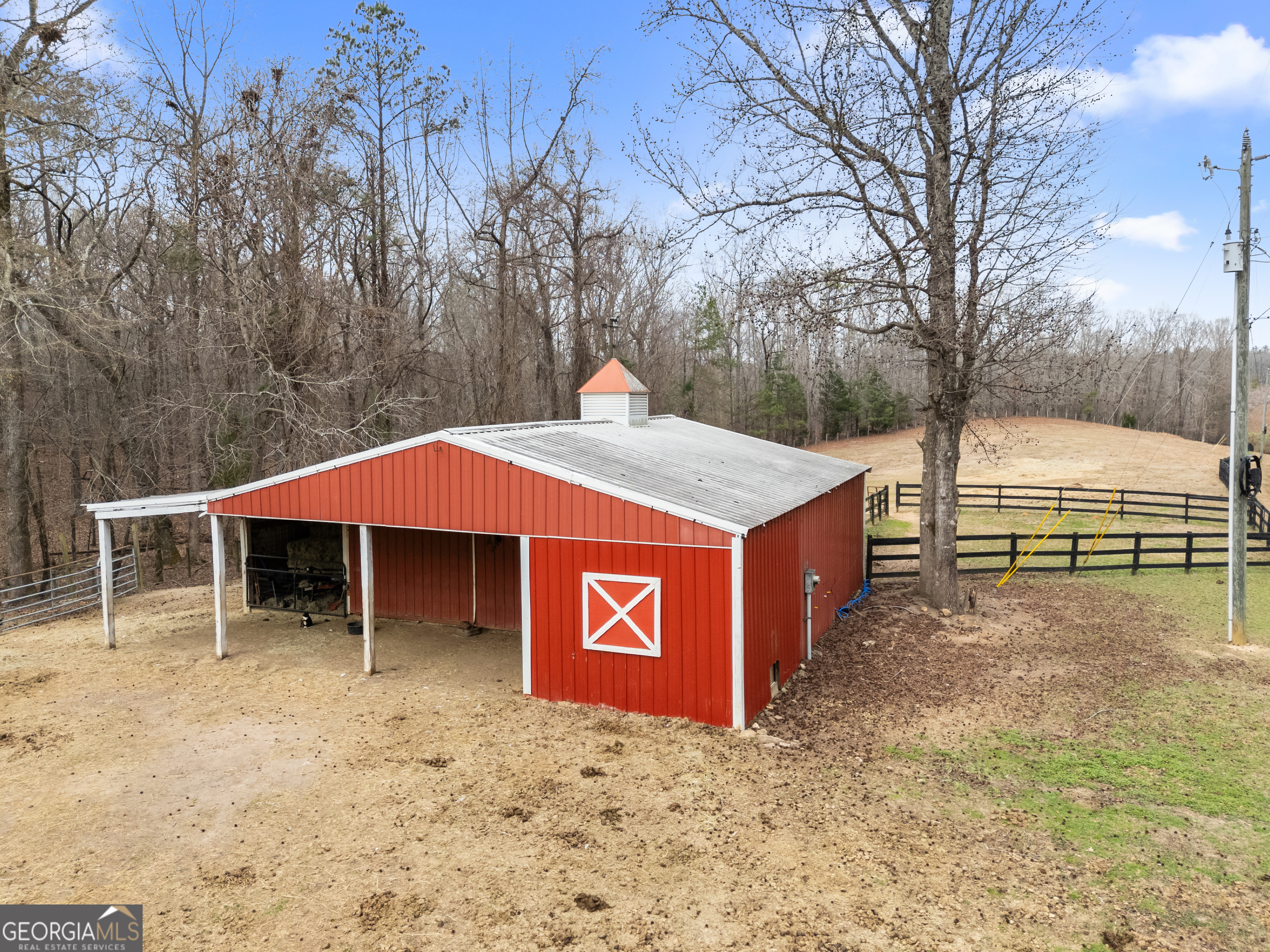 414 Parker Branch Road Barnesville, GA 30204 - Photo 92 of 101 a house with trees in front of it