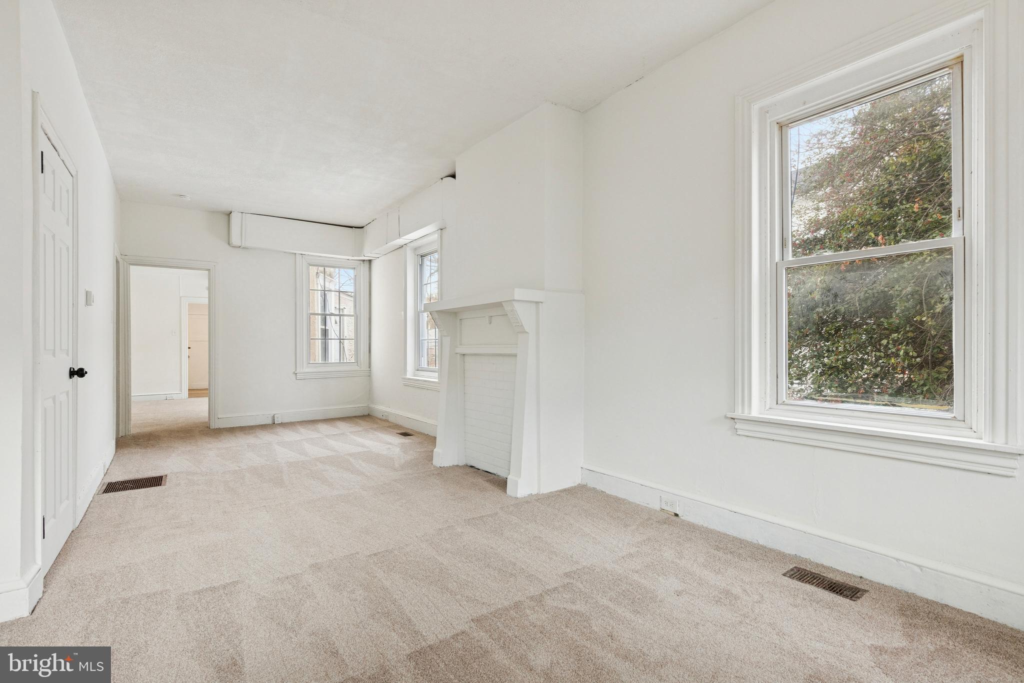 415 Walnut Street Pottstown, PA 19464 - Photo 2 of 15 an empty room with windows