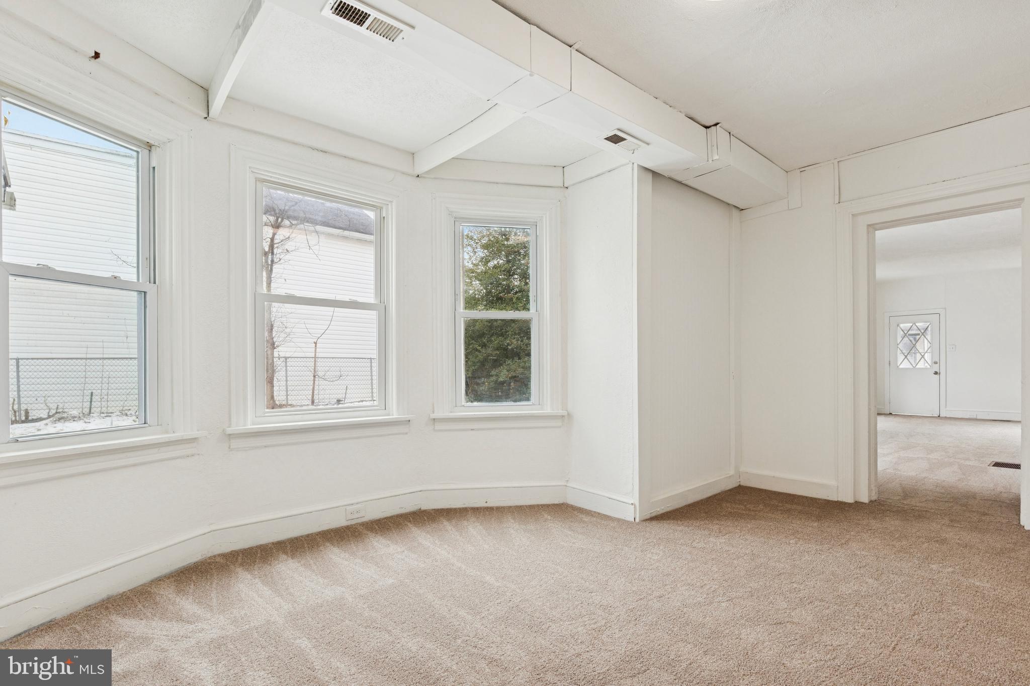415 Walnut Street Pottstown, PA 19464 - Photo 5 of 15 an empty room with windows