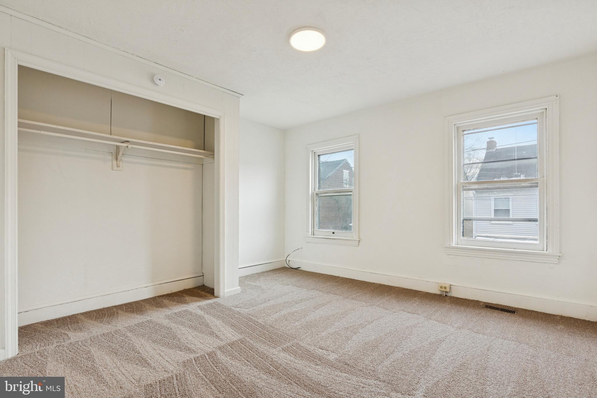 415 Walnut Street Pottstown, PA 19464 - Photo 8 of 15 a view of an empty room with a window