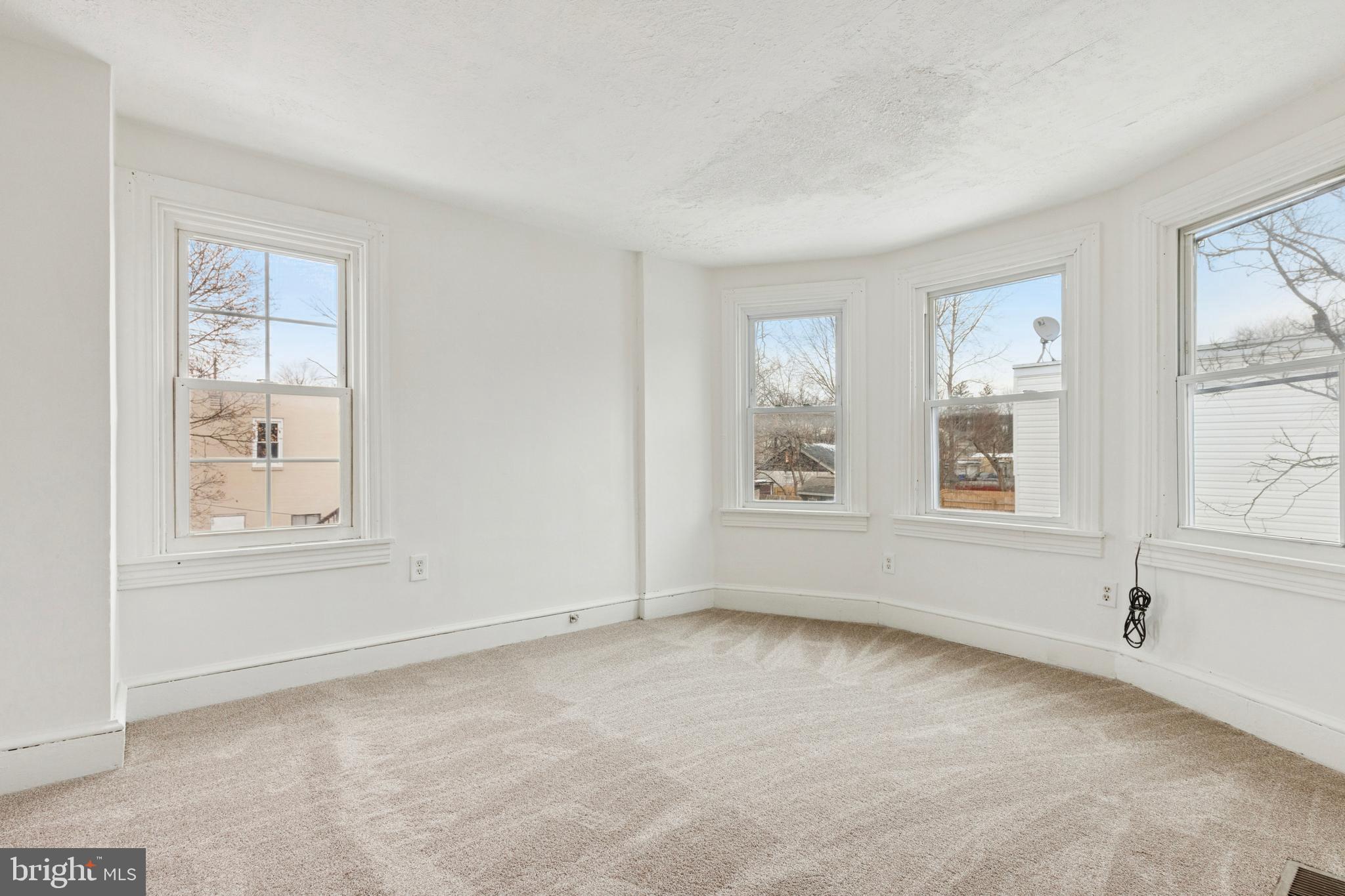 415 Walnut Street Pottstown, PA 19464 - Photo 10 of 15 an empty room with windows