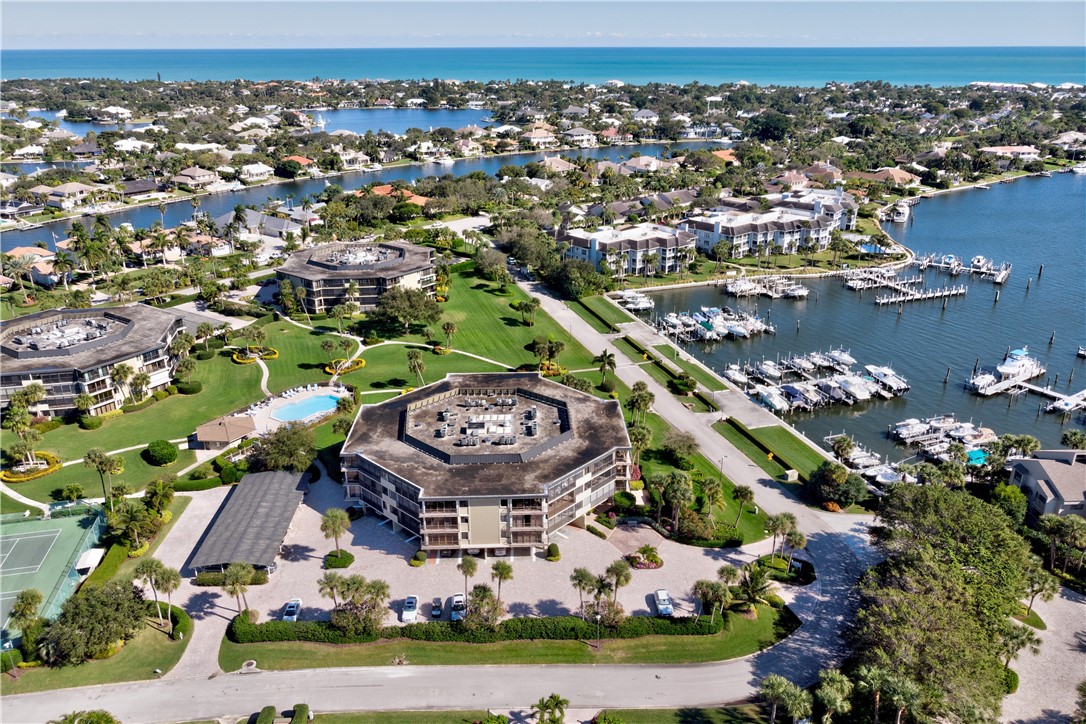 1850 Bay Road, Unit 2C Vero Beach, FL 32963 - Photo 23 of 36 an aerial view of a residential houses with outdoor space and street view
