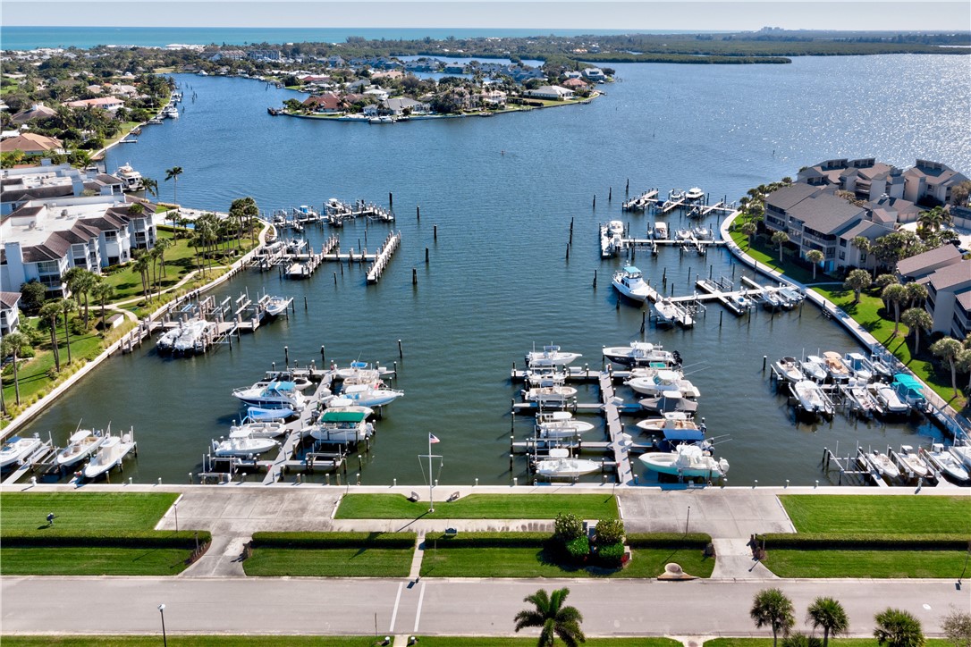 1850 Bay Road, Unit 2C Vero Beach, FL 32963 - Photo 34 of 36 an aerial view of a house with a lake view