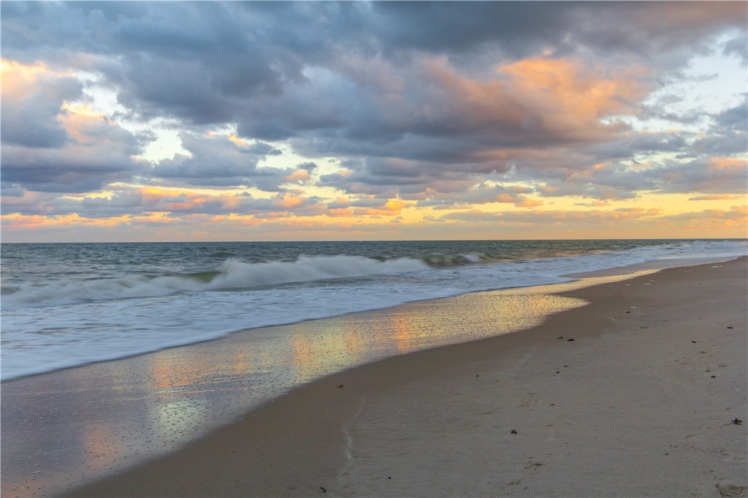 1850 Bay Road, Unit 2C Vero Beach, FL 32963 - Photo 35 of 36 a view of an ocean and beach
