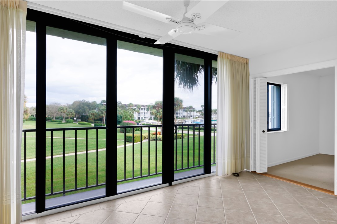 1850 Bay Road, Unit 2C Vero Beach, FL 32963 - Photo 8 of 36 a view of an empty room with a window