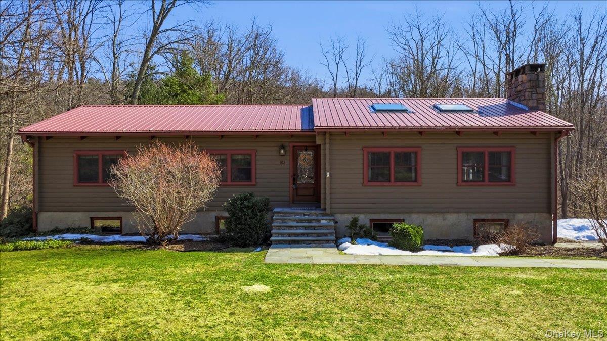 183 Bullet Hole Road Mahopac, NY 10541 - Photo 1 of 44 a view of a house with a yard patio and fire pit