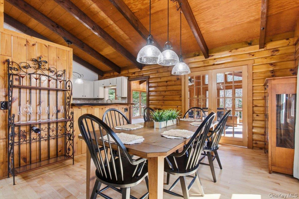 183 Bullet Hole Road Mahopac, NY 10541 - Photo 12 of 44 a view of a dining room with furniture window and wooden floor
