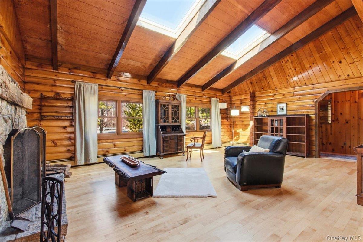 183 Bullet Hole Road Mahopac, NY 10541 - Photo 15 of 44 a living room with furniture and a flat screen tv