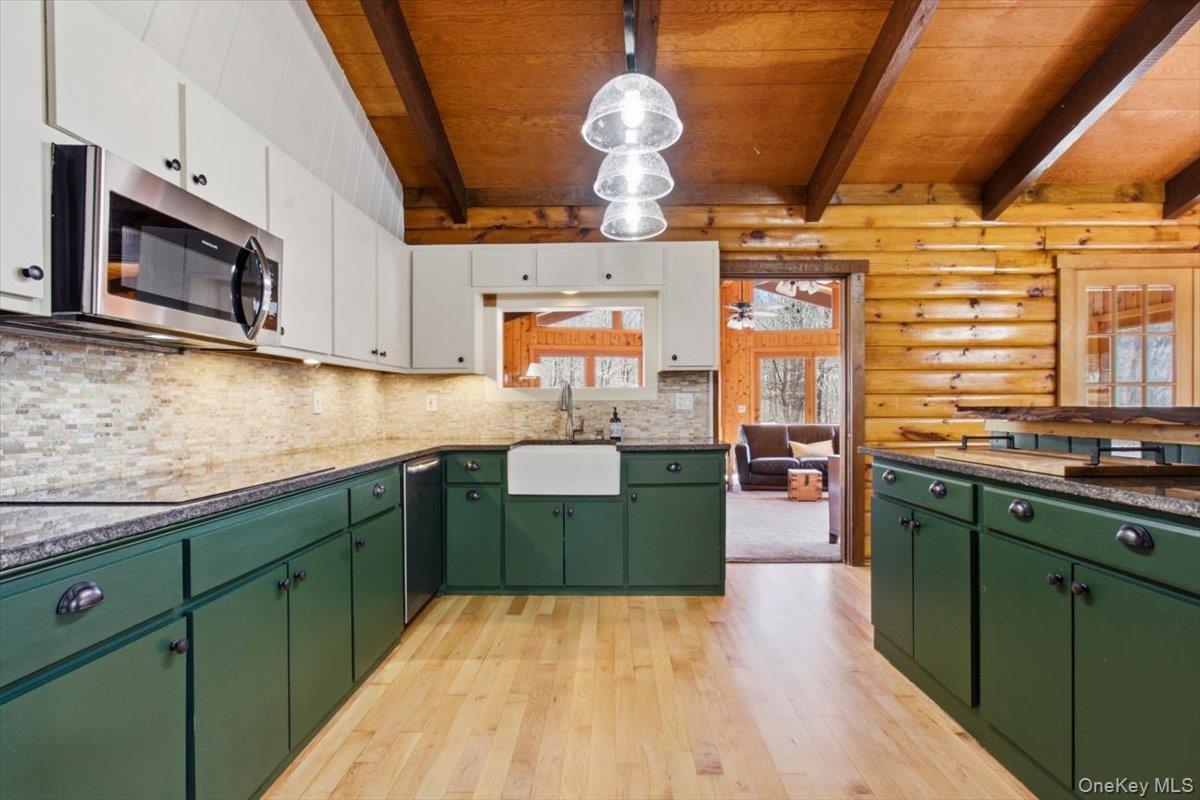 183 Bullet Hole Road Mahopac, NY 10541 - Photo 18 of 44 a kitchen with stainless steel appliances granite countertop a sink and cabinets