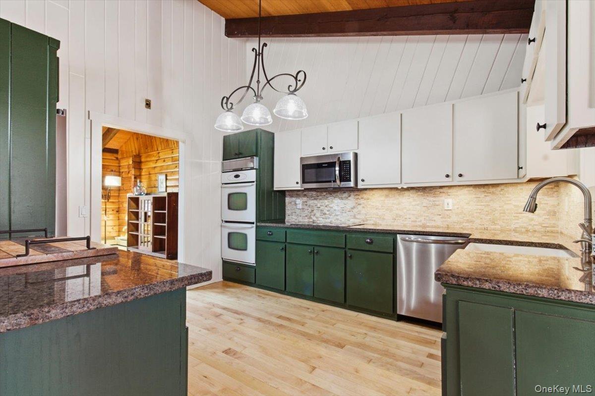 183 Bullet Hole Road Mahopac, NY 10541 - Photo 20 of 44 a kitchen with granite countertop cabinets stainless steel appliances a sink and a window