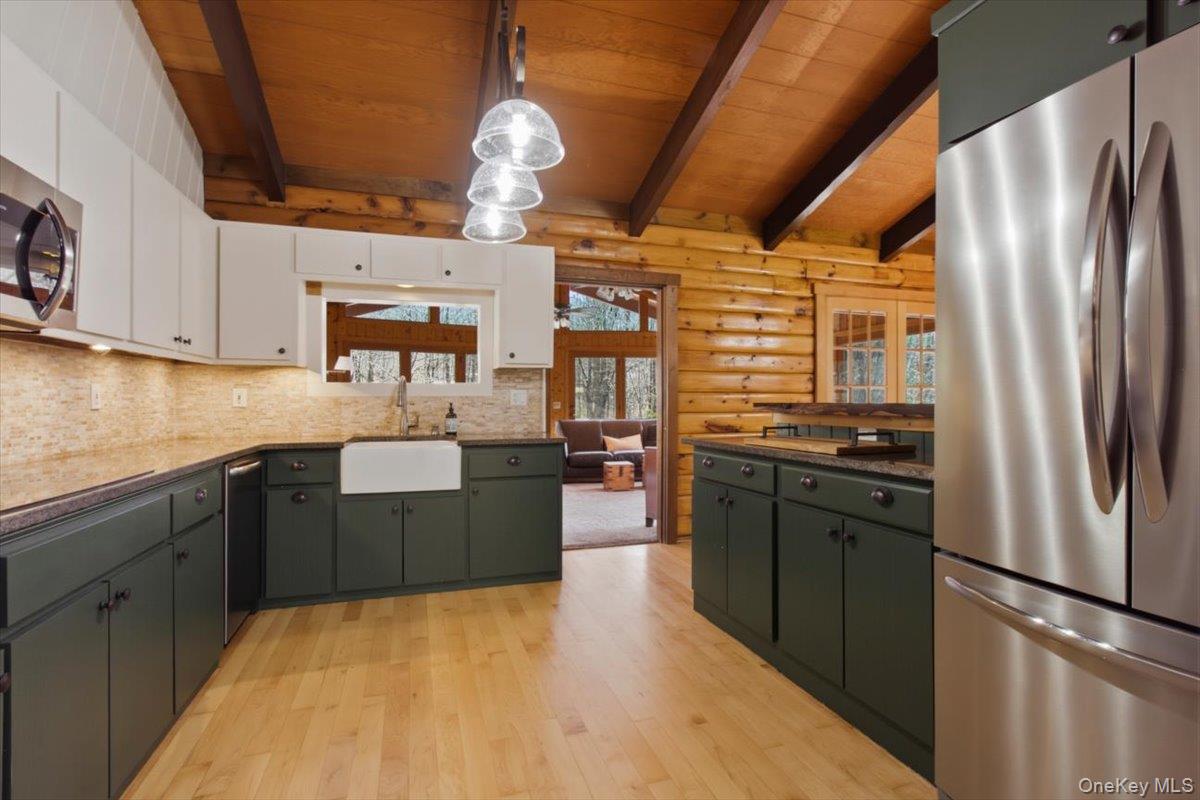 183 Bullet Hole Road Mahopac, NY 10541 - Photo 21 of 44 a kitchen with stainless steel appliances granite countertop a refrigerator a stove and a sink
